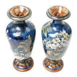 Pair of Doulton Lambeth vases, painted with white flowers, impressed marks to base and signed MA, for Mary Aitken, 1878, H28cm (2)