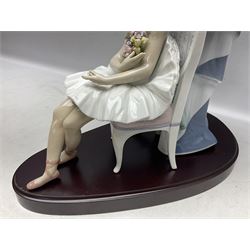 Lladro figure, Jester Serenade, modelled as a ballerina with bouquet of flowers seated before a jester playing the violin, limited edition 2541/3000, sculpted by Antonio Ramos, no 5932, with original box, year issued 1993, year retired 1994, H37cm