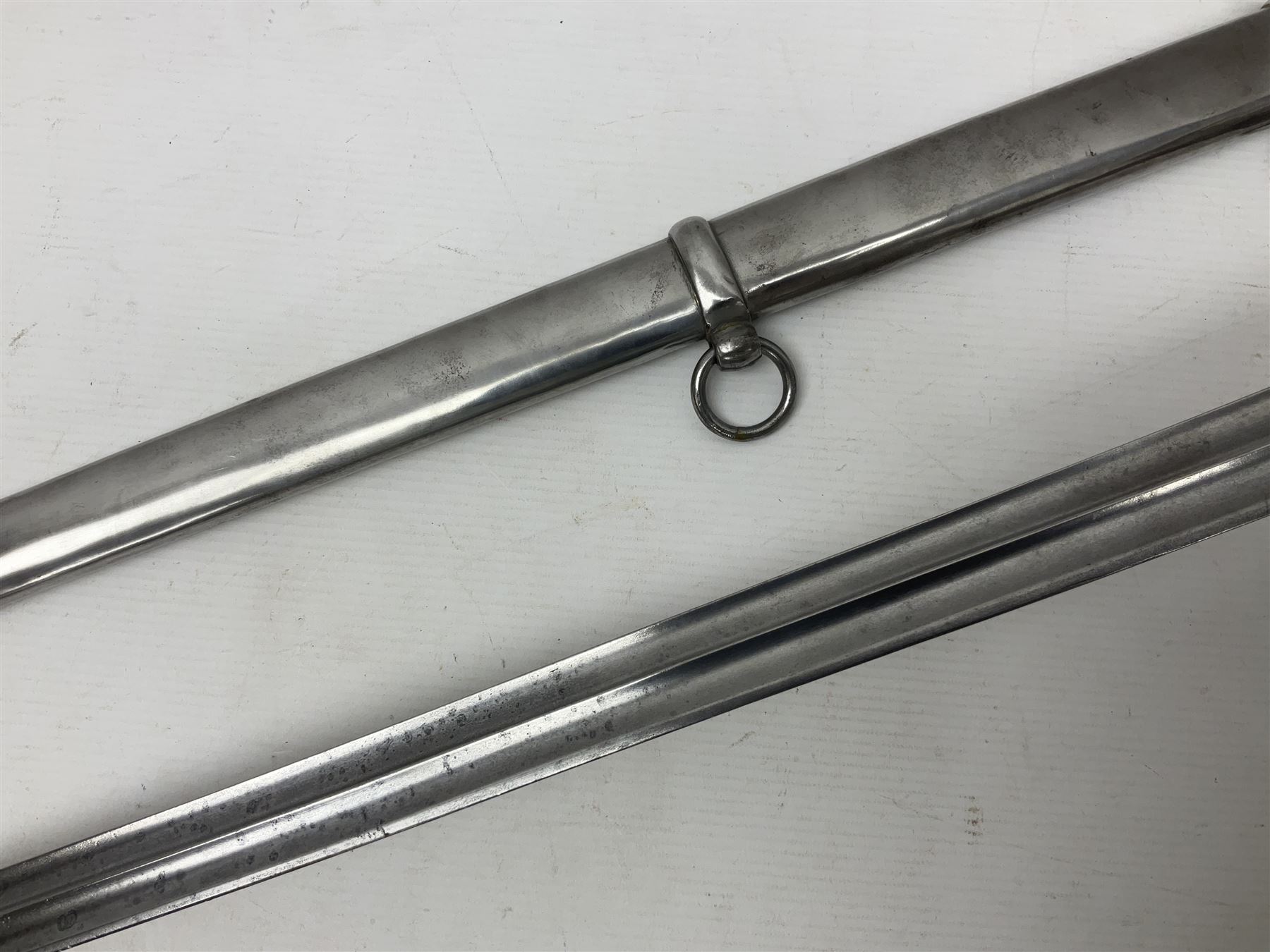 Early 19c French 1st Empire Heavy Cavalry trooper's sword, the 95.5cm double fullered blade with various stamped marks and inscribed Klingenthal 1814 to the back edge, four-bar brass hilt with wire-bound leather grip, knucklebow numbered 139; in polished steel scabbard with two suspension rings L117cm overall