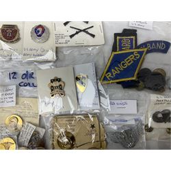 American patches and badges, including para wings, USS Constellation, Strategic Air Command, U.S. military academy, health service regt, Navy Seals, Air Defence Command, Seventh Fleet, various collar badges etc