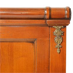 And So To Bed - cherrywood 6' super king 'Nathalie' bed, the panelled headboard and footboard with cylindrical rolled rails, decorative brass mounts to the corners, on square supports with cream and black edged fabric covered base panels 