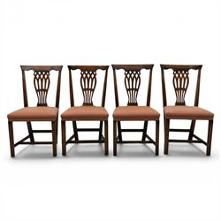 Set of eight George III dining chairs with padded seats, pierced vasiform splat, upholstered seat with brass trim, on square supports with H-stretcher