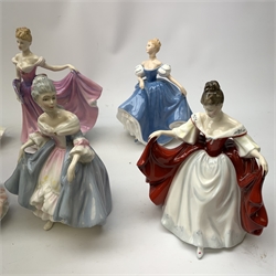  A group of Royal Doulton figurines, comprising Sara HN2265, Southern Belle HN2425, Summer Serenade HN3610, Ruth HN4099, Elaine HN2791, Figure of the year 2000 Rachel HN3976, and Ninette HN2379 (a/f), plus two smaller Royal Doulton figurines, Victoria HN3909, and Christine HN3269 (a/f).  