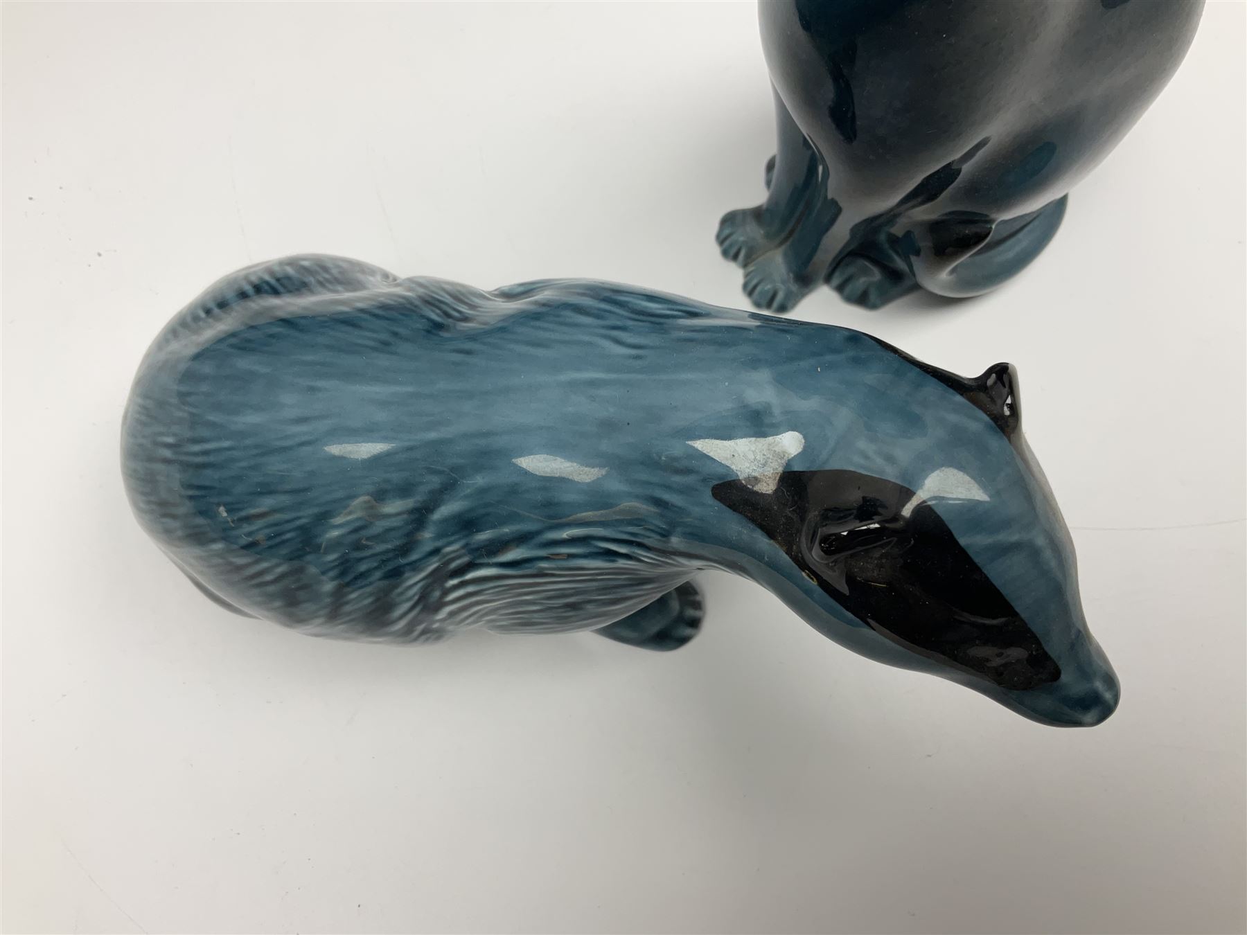 Collection of Poole pottery animals, including frogs, owls, otters, dolphins, mice etc, all with printed mark beneath (23)