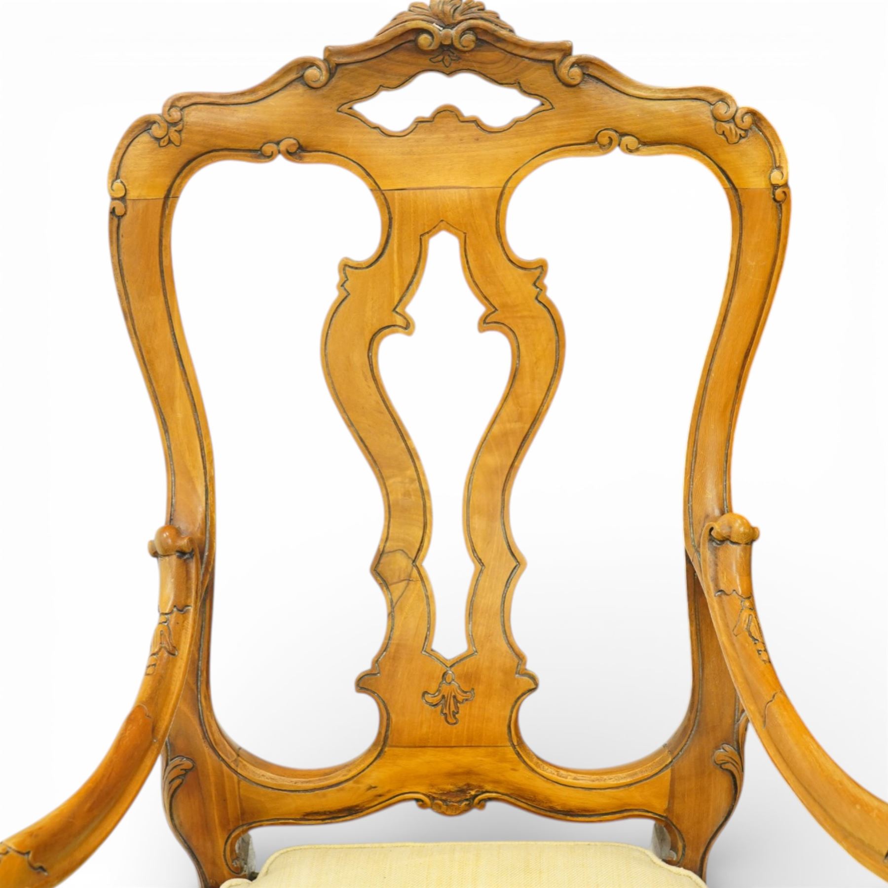 Pair of Italian carved walnut open armchairs, upholstered seats