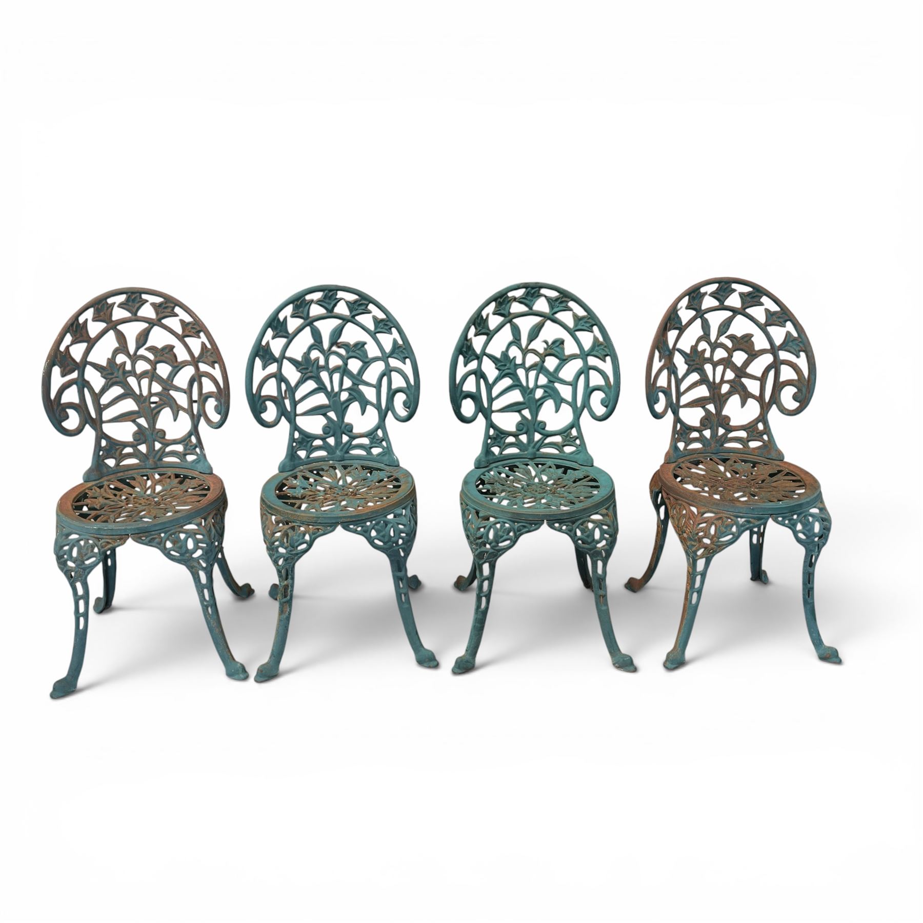 Cast iron garden table and four chairs, in the Art Nouveau style, with pierced floral and foliate decoration throughout, circular table raised on four cabriole legs with stretcher ring, chairs with shaped openwork backs and seats, in a weathered green finish