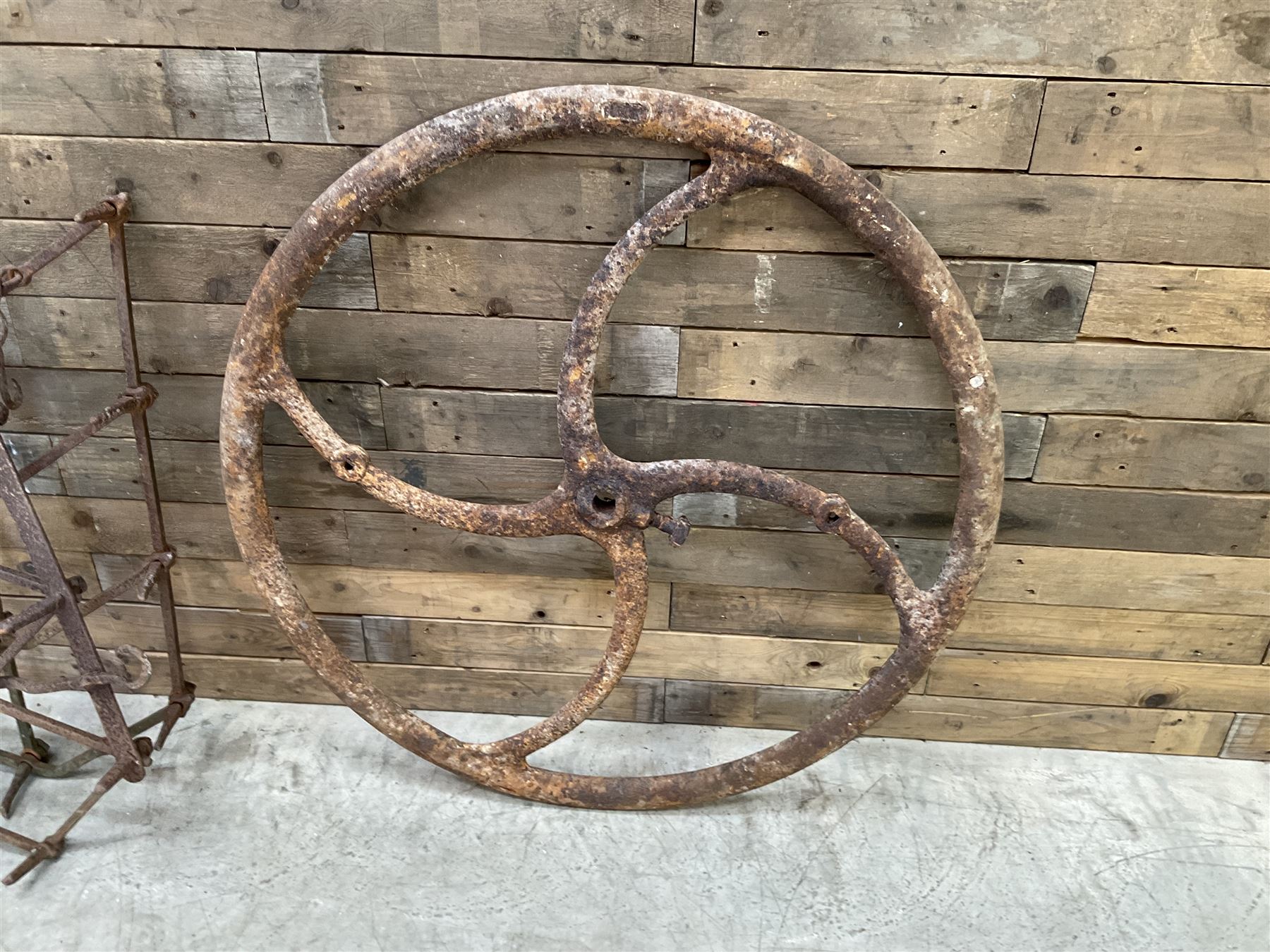 Two vintage agricultural harrows and cast iron machinery wheel/gear