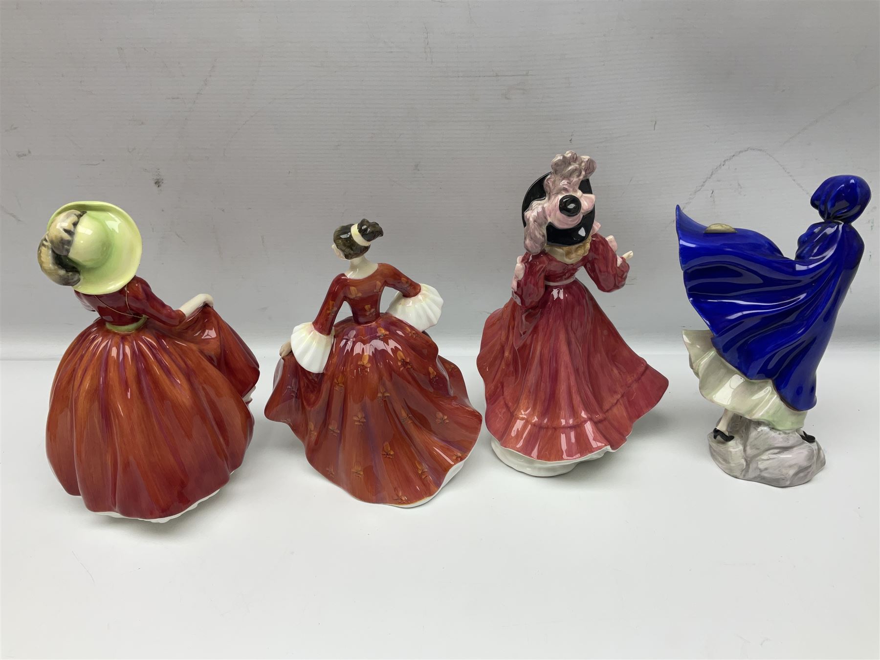 Ten Royal Doulton figures, to include Lydia HN1908, Goody Two Shoes HN2037, May HN2746, A Single red Rose HN3376, etc, nine with original boxes 