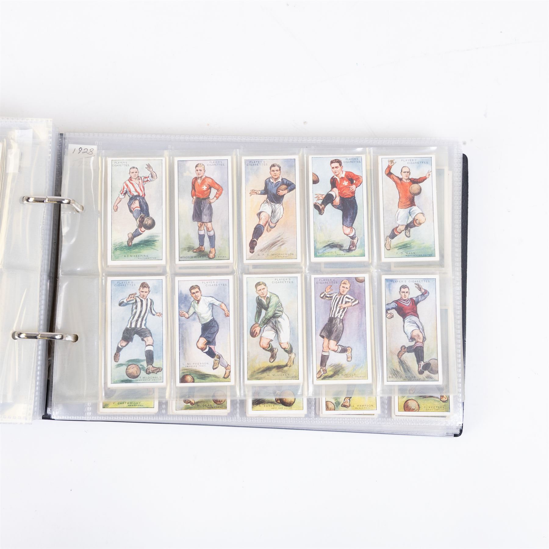 Collection of Edwardian and later Football related trading and cigarette cards, including forty-nine of fifty 1906 Ogden's Football Club Colours, 1922 PALS Footall series, ninety of one hundred 1925 Gallaher Famous Footballers, complete set of forty-four 1926 Ogden's Captains of Association Football Clubs and Colours, complete set of fifty 1927 Players Football Caricatures by MAC,  complete set of fifty 1927 Players Football Caricatures by RIP,  complete set of fifty 1930 Players Association Cup Winners, complete set of 50 1933 Ogdens AFC Nicknames etc, housed in brown cigarette card album