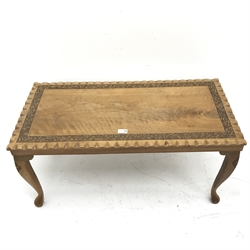 White standard lamp with shade (H158cm) and a carved wood coffee table 
