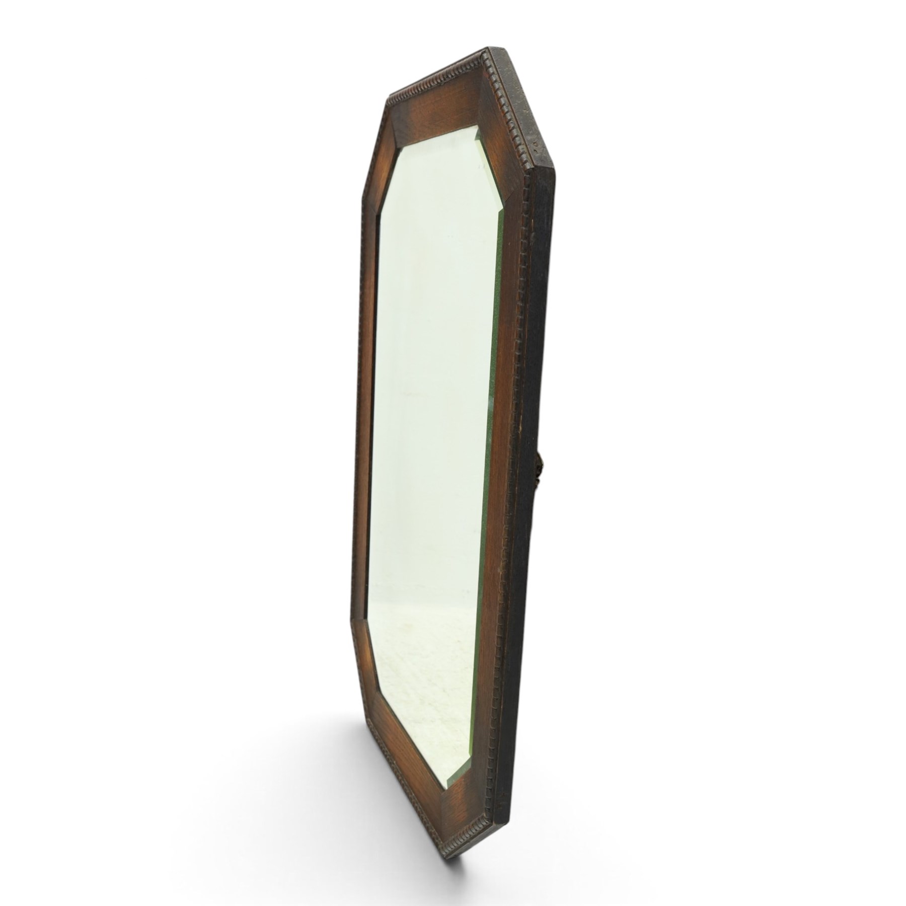 Early 20th century oak wall mirror, canted rectangular frame with bevelled plate 
