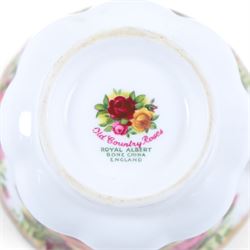 Royal Albert Old Country Roses tea set, comprising cake stand, milk jug, seven dessert plates, seven cups and ten saucers 