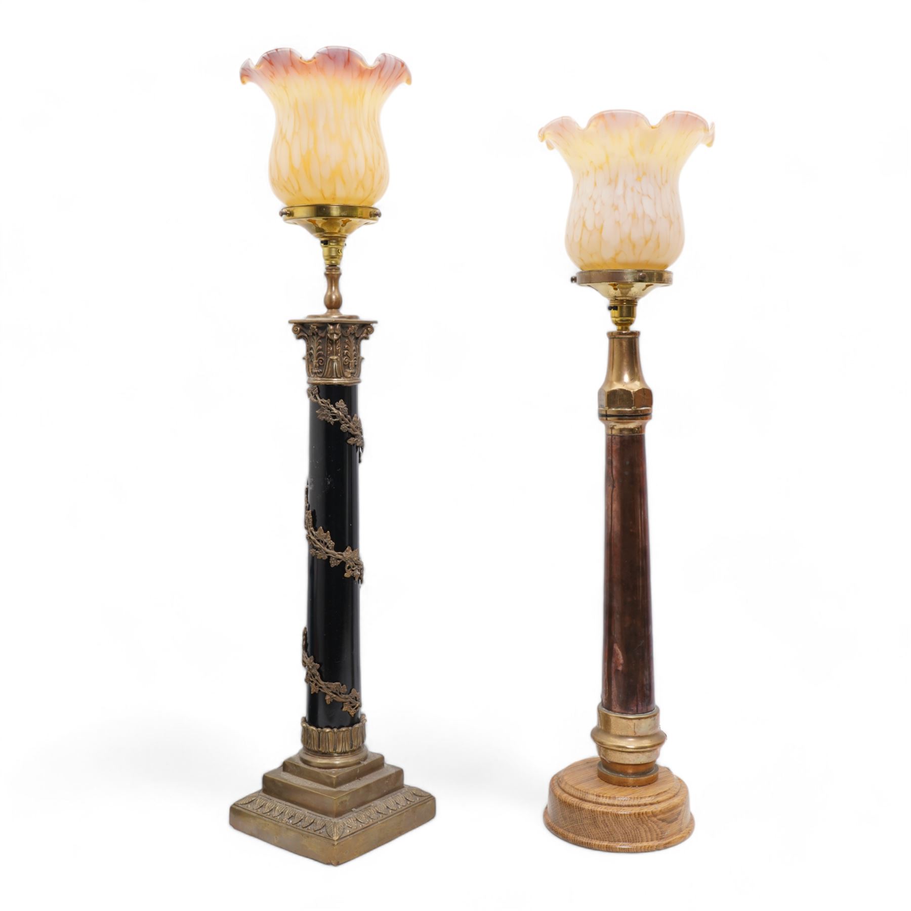 Victorian copper and brass fire hose branch, converted to a table lamp, on circular wooden plinth, H63cm together with a 20th century brass and ebonised corinthian column table lamp, with vine entwined stem and leaf cast square base, both with mottled glass shades (2)