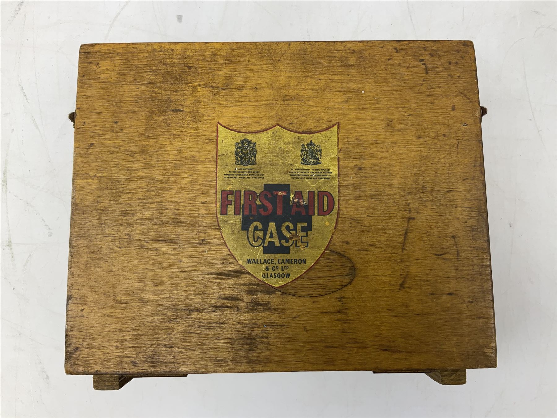 Victorian walnut box with Tunbridge ware banding and mother-of-pearl inlay, W29.5cm H14cm, together with first aid kit box and Group of early 20th century ornate gold plated (tested) and gilt brooch frames and panel fronts