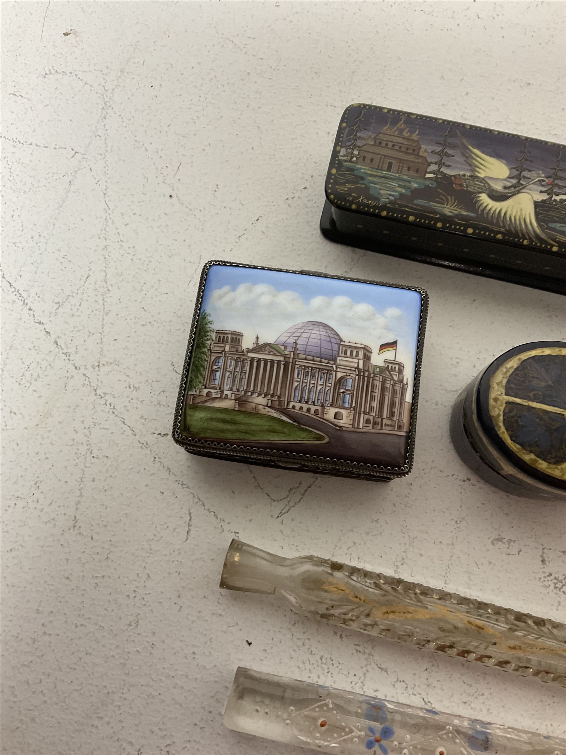 Two 19th century glass tear catcher lachrymatory bottles, together with a Japanese lacquered box and two similar, a trinket box with ceramic cover and a small pewter figure of Confucius