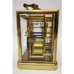  19th century brass carriage clock attributed to 'Paul Garnier of Paris', engine turned silvered Roman dial, twin train movement with chaff-cutter escapement, petite sonnerie, striking the hours and quarters on two coils, with repeater, polished brass case with five bevelled glass panes, hinged carrying handle, the back plate inscribed 'halfield et hall Paris... 828', H14cm (minus handle), in green leather case  Serviced - 10/11/18  