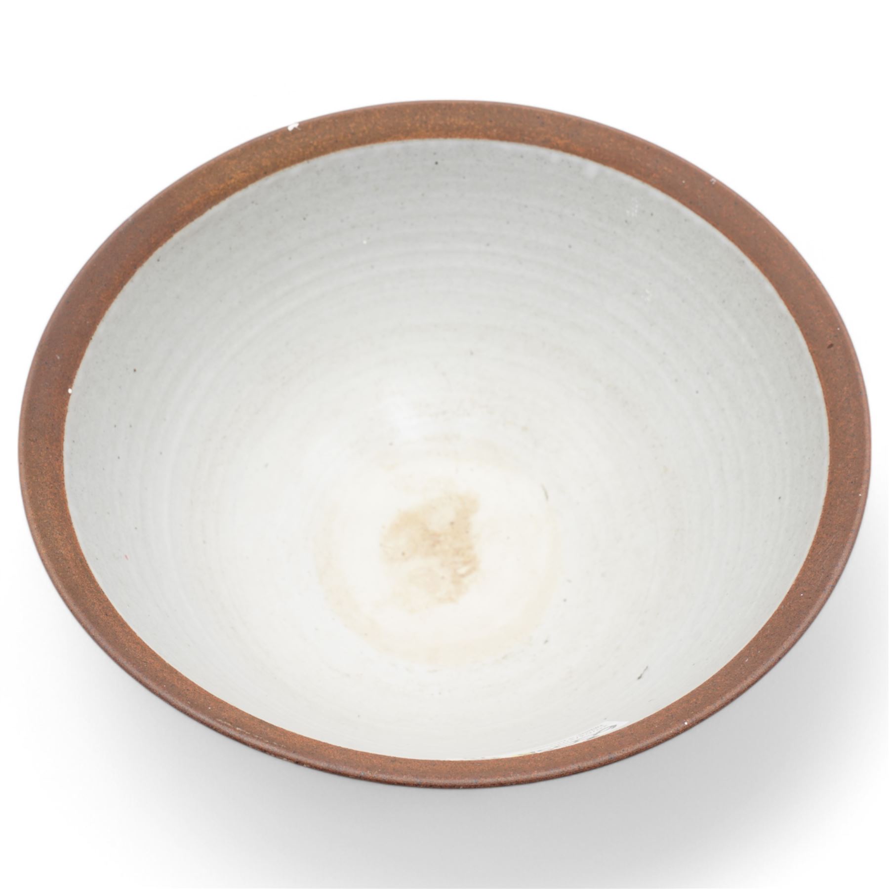 David Lloyd Jones (1928-1994); large studio pottery stoneware bowl, in speckled grey glaze with irregular iron rim, impressed mark to base, D32cm 