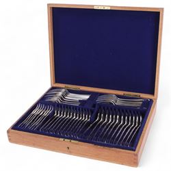 Georgian silver matched Old English pattern canteen for twelve place settings, comprising table spoons, table forks, dessert spoons, and side forks, hallmarked London, dates ranging from 1798 to 1828, various makers marks, contained within a later oak fitted box with engraved brass cartouche to the hinged cover
