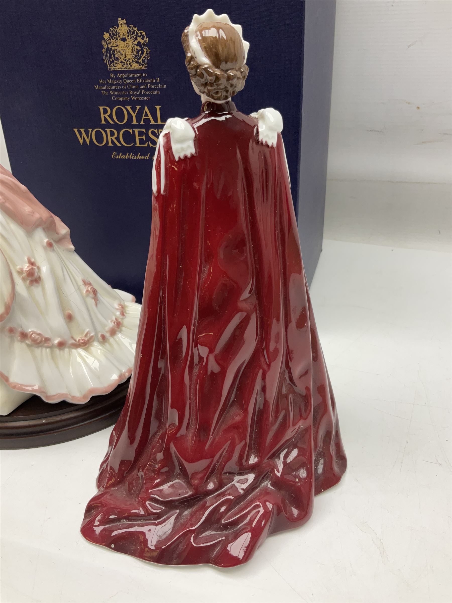 Three Royal Worcester figures, comprising Glyndebourne, with original box, Royal Worcester Special Even 1998 Elizabeth, with certificate and original box, and In Celebration of the Queens 80th Birthday 2006 