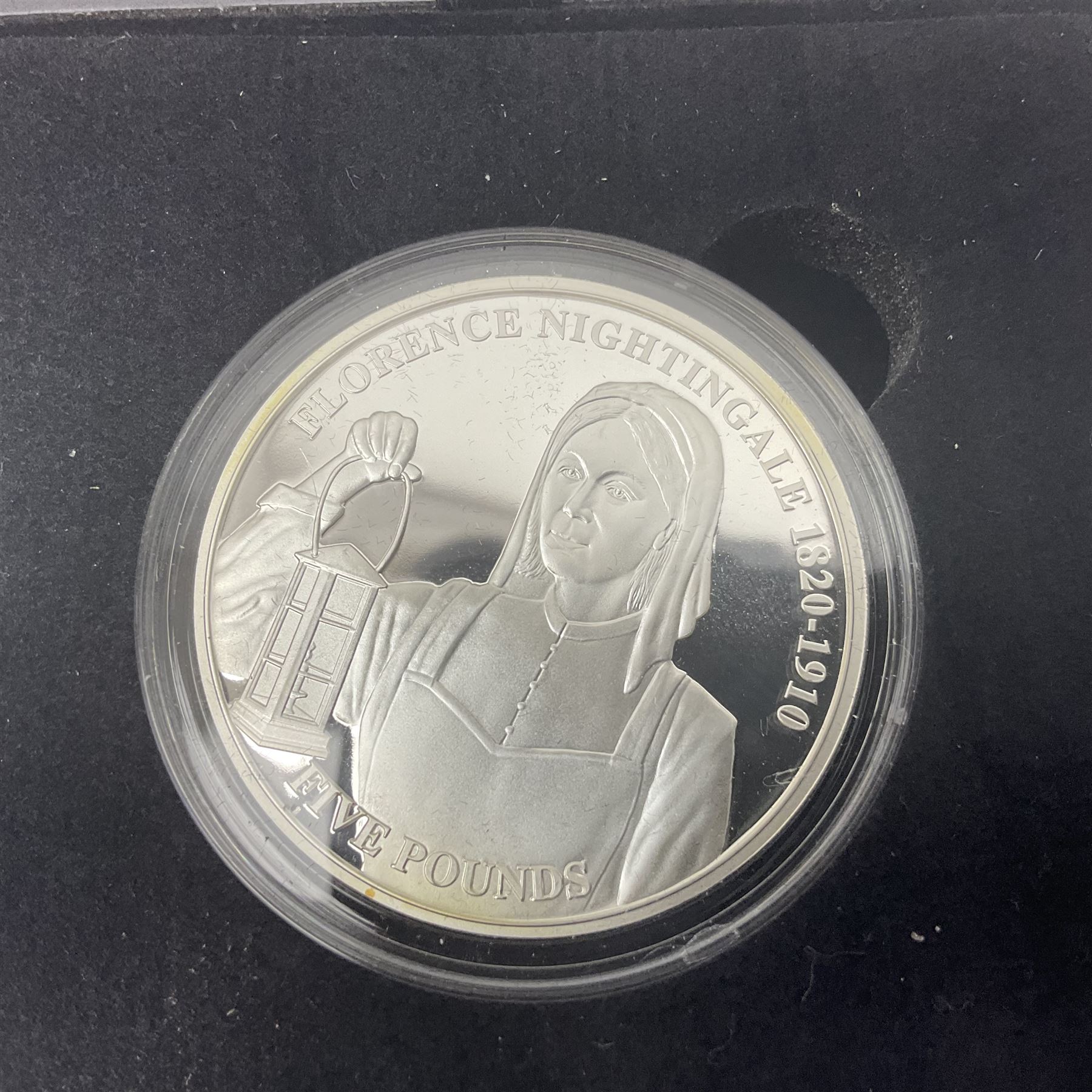 Queen Elizabeth II Channel Islands and Isle of Man silver proof five pound coins, comprising Bailiwick of Jersey 2016 'Lest we Forget', 2019 'D-Day 75th Anniversary' three coin set', Bailiwick of Guernsey 2020 'Florence Nightingale 200th Anniversary' and Isle of Man 2021 'William and Kate Wedding Anniversary', all cased with certificates
