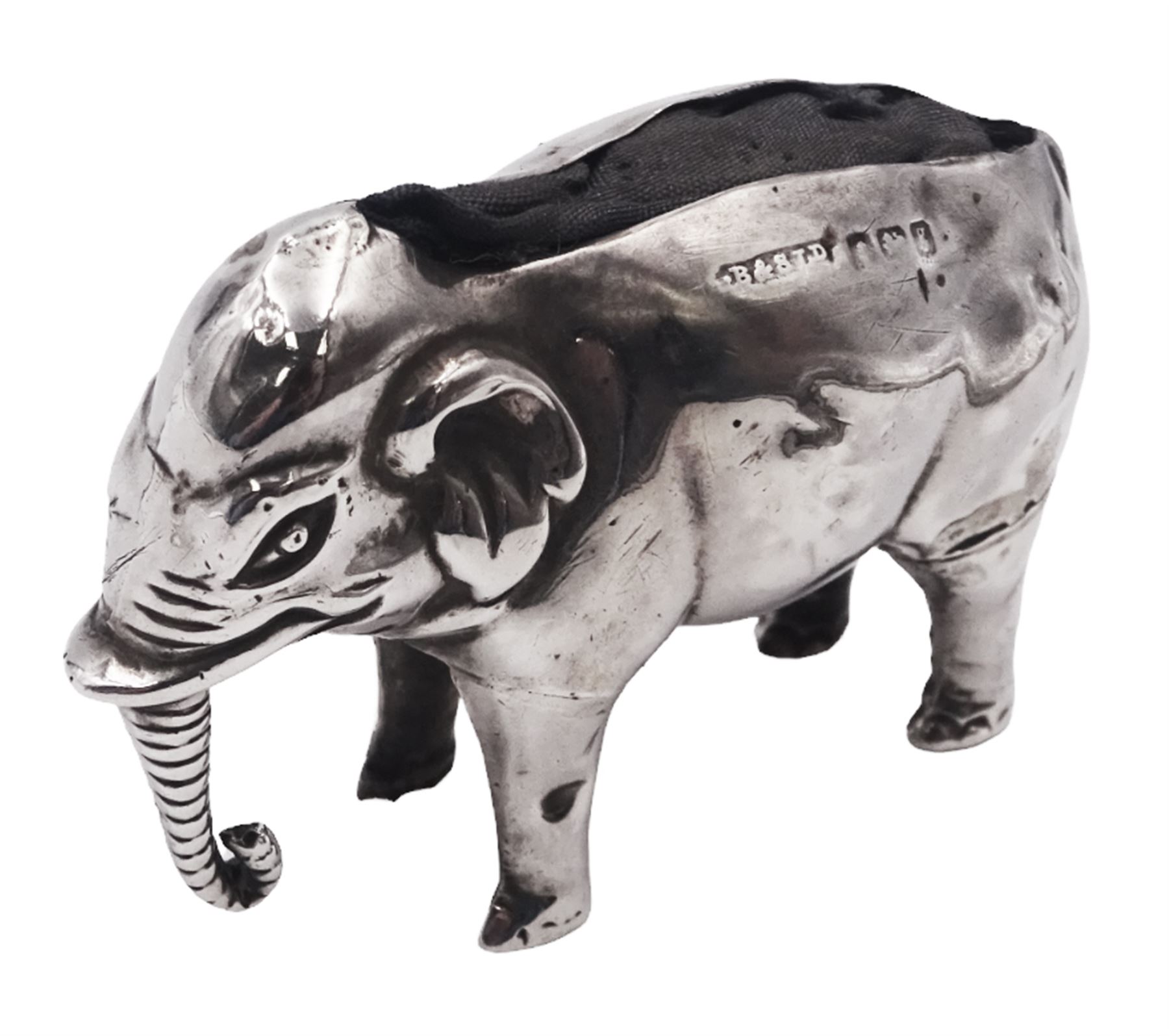 Edwardian silver novelty pin cushion, modelled as an elephant with cushioned back, hallmarked Birmingham 1906, maker's mark indistinct, H3.2cm, approximate total weight 0.46 ozt (14.1 grams)