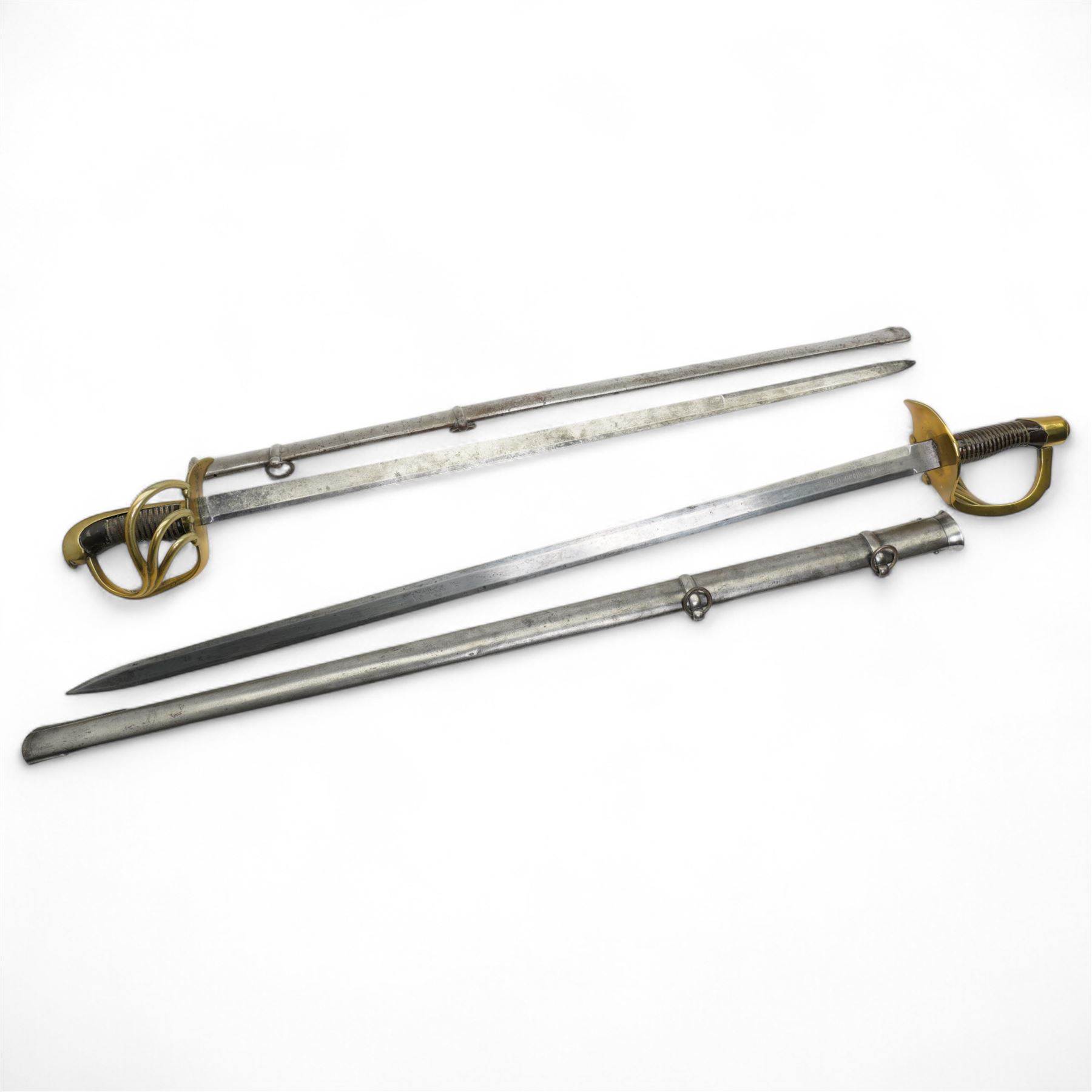  19th century Spanish cavalry sword, the blade marked 'Toledo 1868' with pierced brass hilt and wire wound grip with steel scabbard, blade length 93cm and another similar Spanish sword, unmarked blade (2)