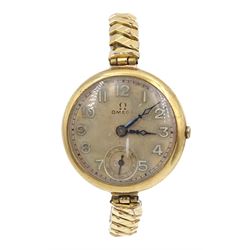 Omega 9ct gold manual wind wristwatch, No. 8461156, silvered dial with subsidiary seconds hand, case by Aaron Lufkin Dennison, Birmingham 1936, on gold-plated expanding bracelet