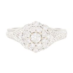 9ct gold diamond cluster ring, set with round brilliant cut diamonds and diamond set shoul...