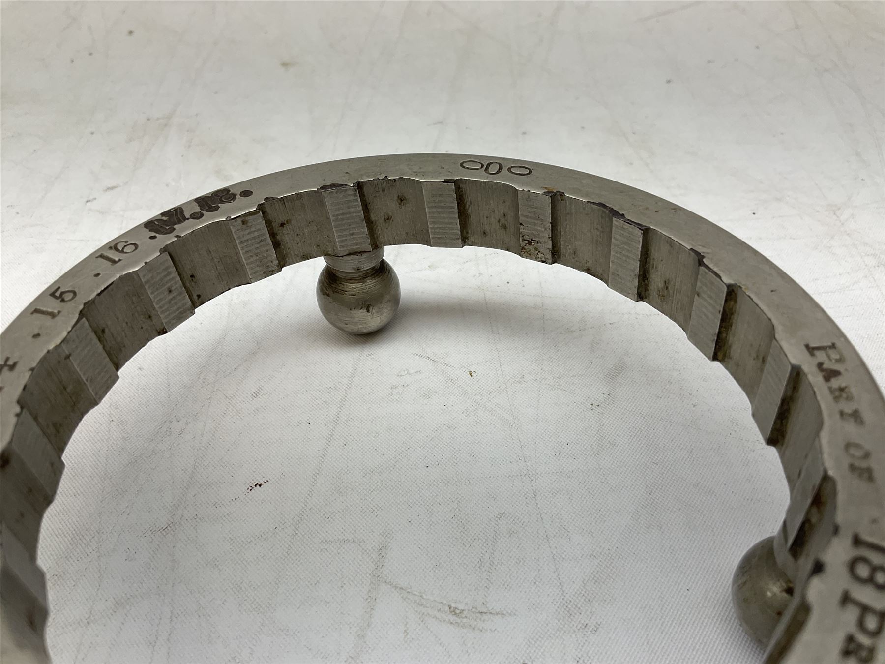 WW1 Trench Art - trivet on three ball feet formed from a section of a gun barrel inscribed 'Part of 18Pr Field Gun, as used in European War 1914.15.16.17.18.' D10cm