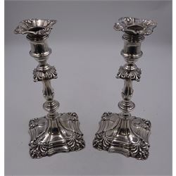 Pair of Edwardian silver mounted candlesticks, each of knopped and part fluted form, upon square stepped base with anthemions to each corner, with conforming sconces, hallmarked Thomas Bradbury & Sons Ltd, Sheffield 1901