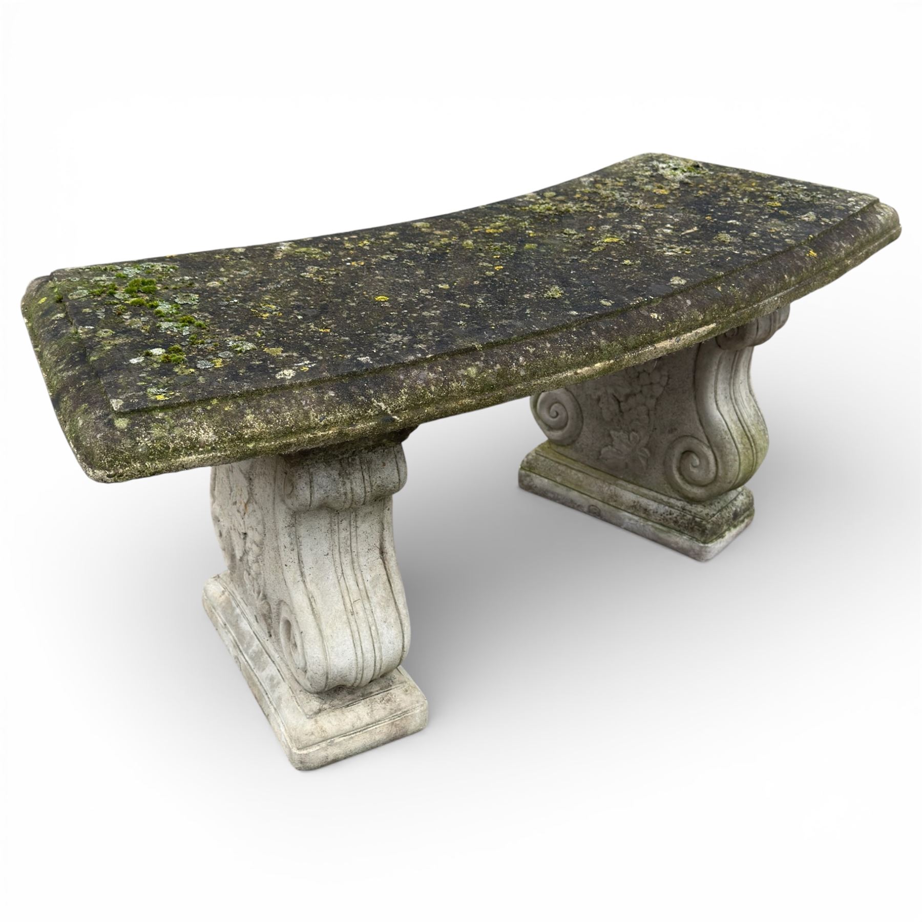 Composition stone garden bench with scroll supports