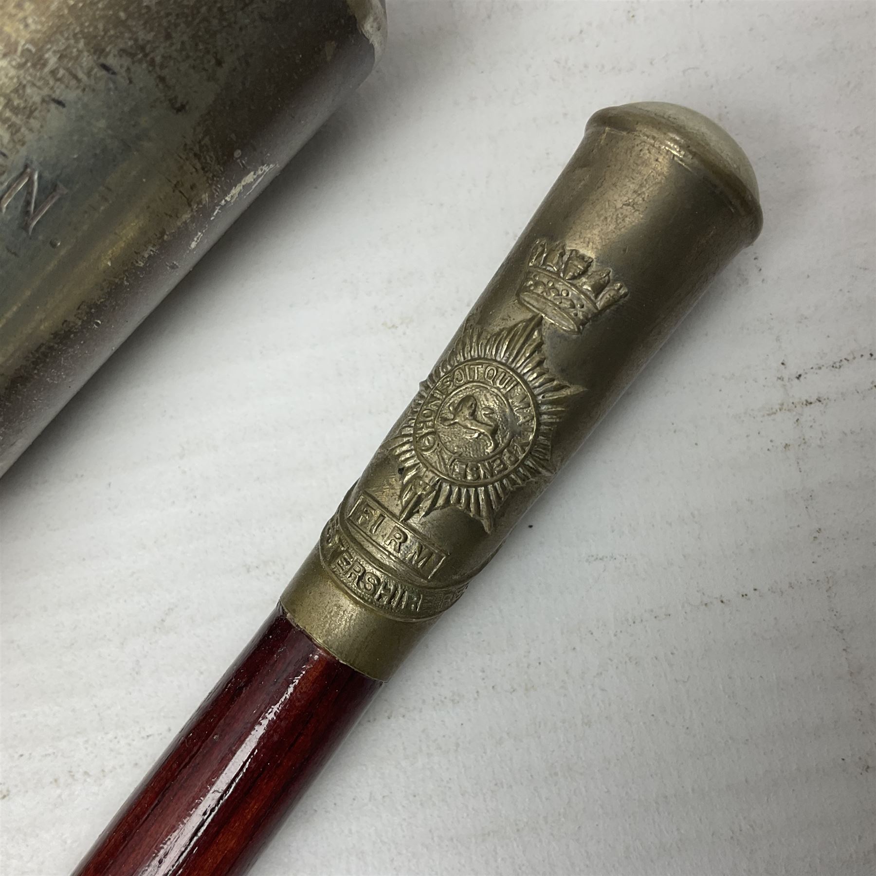 Three parade ground canes - malacca cane Coldstream Guards with plated mount engraved 'H.A. Myhan' L87cm; ebonised Church Lads Brigade 'Fight The Good Fight'; and mahogany stained Worcestershire Regiment (3)