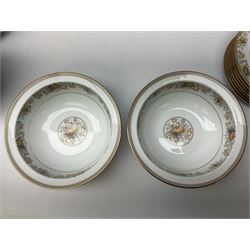 Noritake Ireland tea and dinner wears, comprising of teapot, milk jug, covered sucrier, seven teacups and saucers, seven dessert plates, six dinner plates, seven side plates, five bowls two serving dishes, one lidded tureen and a gravy boat and dish