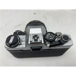 Four Olympus camera bodies, including Olympus OM10, serial no 20744269, with 'Olympus OM-System Zuiko Auto-S 50mm 1:1.8' lens serial no 3633644, Olympus OM-2 camera body serial no 460280 with 'Olympus OM-System G.Zuiko Auto-s 1:1.4 f=50mm' lens, serial no 729750, etc 