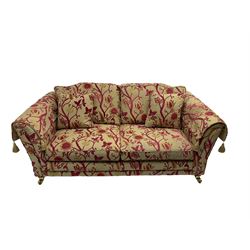 Three-piece lounge suite - large two-seat sofa upholstered in red and gold striped fabric (W185cm, H90cm, D105cm); two-seat sofa upholstered in red and gold floral pattern fabric (205cm, H90cm, D105); matching rectangular footstool (75cm x 55cm, H39cm)