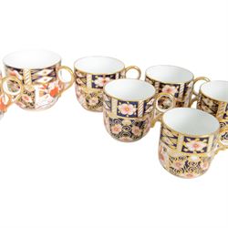 Royal Crown Derby Imari 2451 pattern, cups and saucers of various sizes, comprising ten cups and nine saucers  