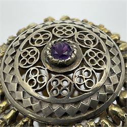 Modern silver limited edition Easter egg, no. 70/500, the gilt openwork body decorated with cascading bluebells and hinged cover with pierced circular panel set with a single faceted purple stone, opening to reveal a gilt interior, upon silver stand with three scrolling pad feet, each hallmarked St James House Company, London 1981, height including stand 8cm