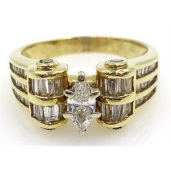  Baguette and central marquise cut diamond, gold scroll ring, stamped 14K  