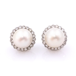  Pair of 18ct white gold South Sea pearl and diamond cluster stud ear-rings, each set with pearl 11mm, and twenty diamonds hallmarked  
