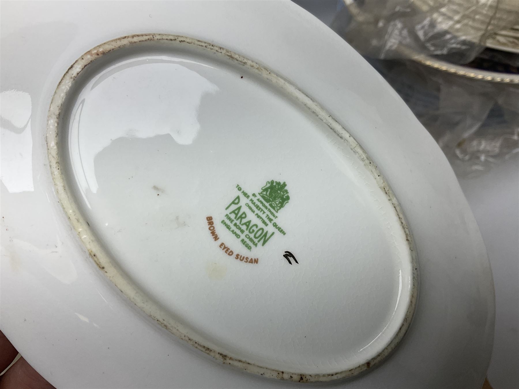 Collection of tea and dinner wares, to include Crown Clarence wares, two Maling cups and saucers, etc,  together with three Foley twin handled urns etc, in three boxes