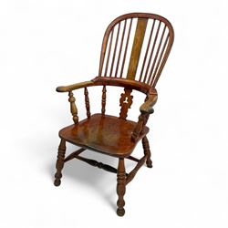 Early 20th century Windsor elbow chair, shaped elm seat with hooped back and pierced centr...
