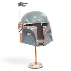 Hasbro Star Wars Black Series Boba Fett 40th Anniversary 1:1 scale helmet, on a metal disp...