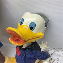 Two Pelham Puppets - The Magic Roundabout Mr. Rusty pole puppet with wool hands and blue  coat dated 1963; boxed; and Type SL Disney Donald Duck; unboxed (2)