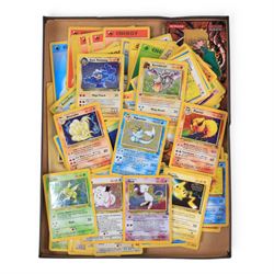 Collection of  Wizards Of The Coast Pokemon trading cards including Base Set, Jungle Set, ...