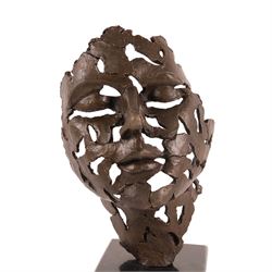Bronze abstract sculpture of a pierced face, upon a squared marble base, H27cm