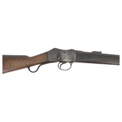 Martini-Henry MKII/2 Carbine, the 52cm round barrel with various inspectors marks,   fitted with ladder sight, with various inspector's marks, the action marked Enfield, the walnut full stock with two steel barrel bands, the butt inset with brass roundel stamped' 12 1893 V 1 GR. A 6', and with Sold Out of Service arrows to the butt, action and barrel, steel cleaning rod beneath, overall 96cm
Sold as an exempt item under Section 58 (2) of the 1968 Firearms Act, to be held as a curiosity or ornament


