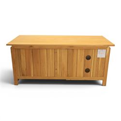 Contemporary light oak television or media unit, two drawers and two open shelves, with apertures for wires