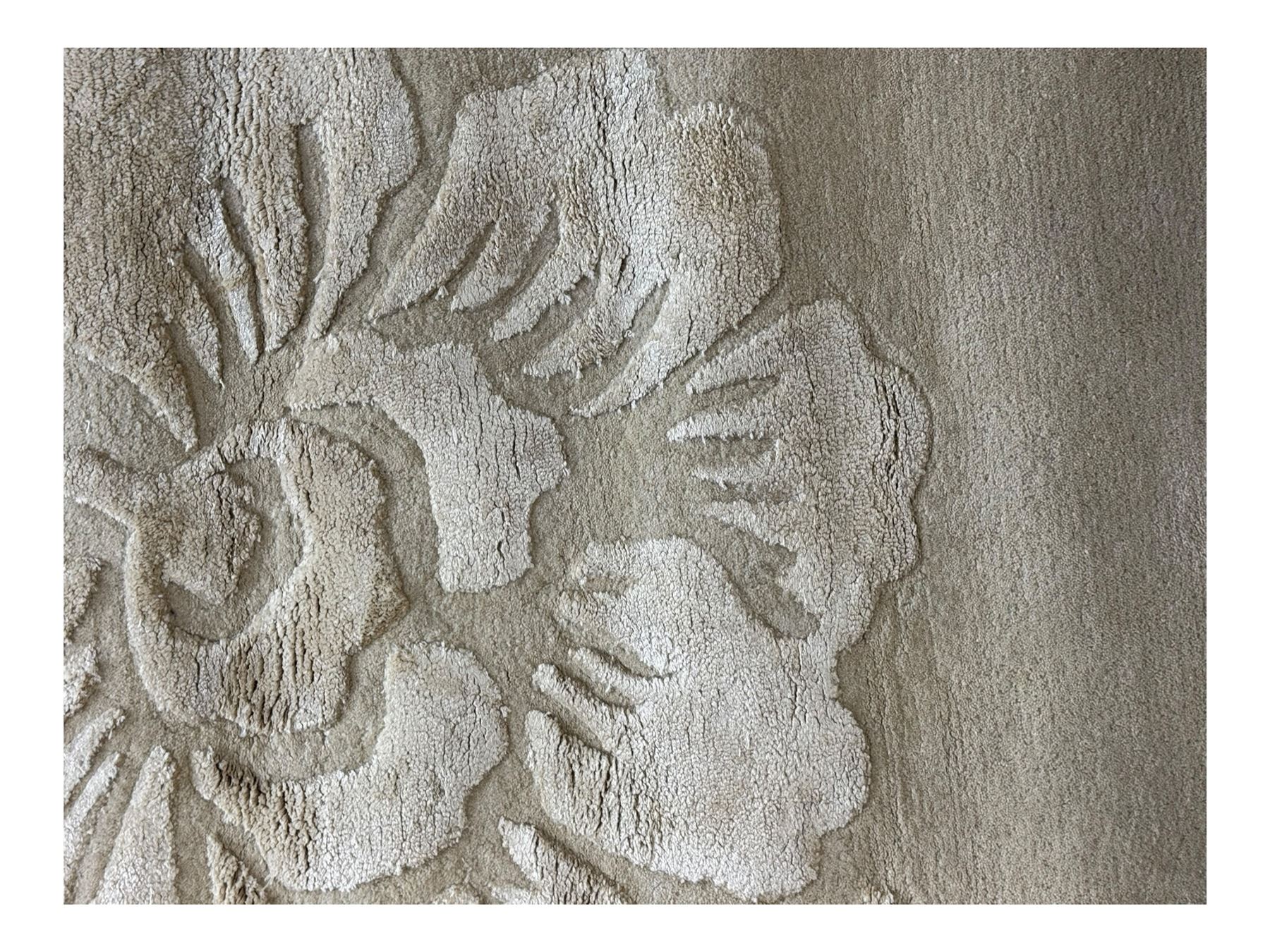 Laura Ashley - India made Claverton ground rug, monochromic taupe ground with relief floral motifs in a soft cream shade