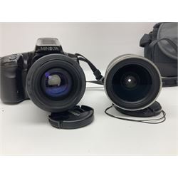 Four Minolta camera bodies, to include Dynax 500si, serial no. 94812651 with 'Signa Zoom 1;3.5-4.5 f=28-70mm' lens, Maxxum 300si, serial no. 97821665, with 'Tamron AF 80-210mm' lens and Dynax 300si, serial no 01603265'  with Minolta AF Power Zoom 35-80mm 1;4' lens, etc, together with Pantax MV1 camera bodies and other camera equipment 