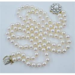 Double strand cultured pearl necklace, with 18ct gold diamond and pearl set clasp hallmarked